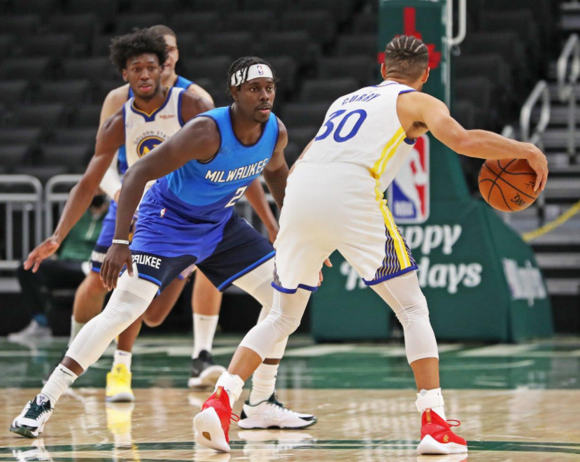  霍勒迪防守制胜雄鹿主场力克76人巩固东部第二